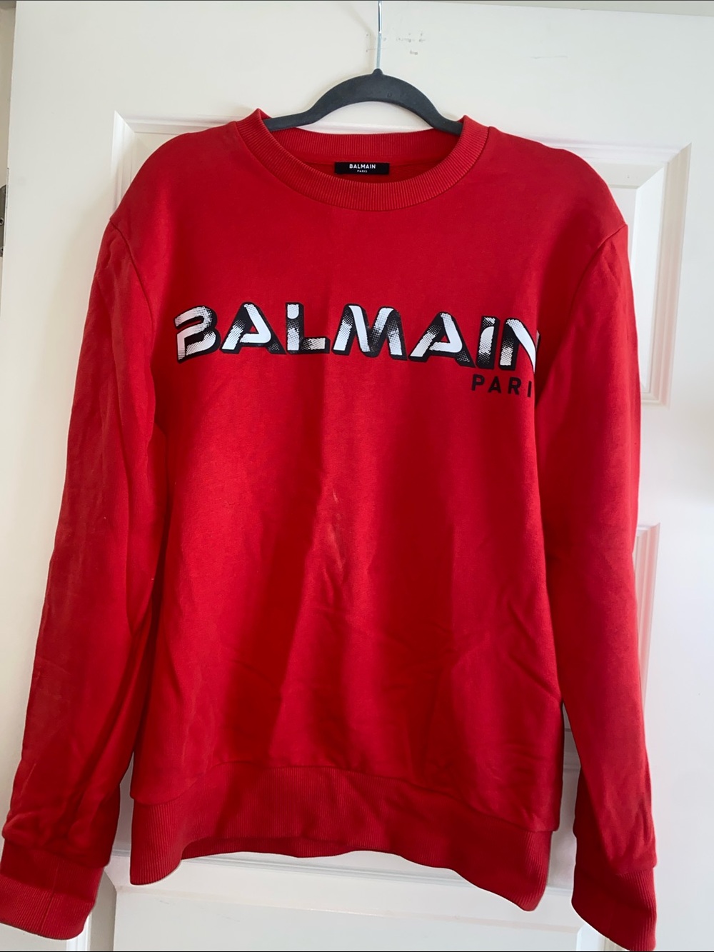Balmain Red Crewneck Sweatshirt with Contrasting White-Outlined Logo